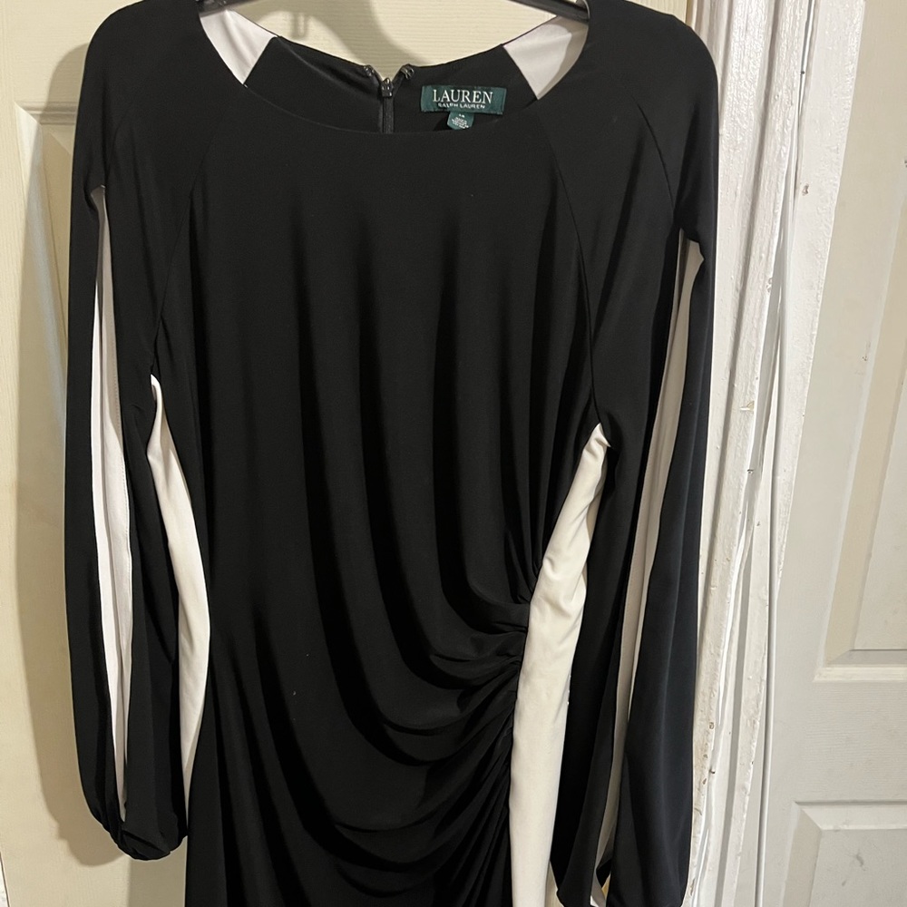 Beautiful black and white dress with gathering at the side comfortable.